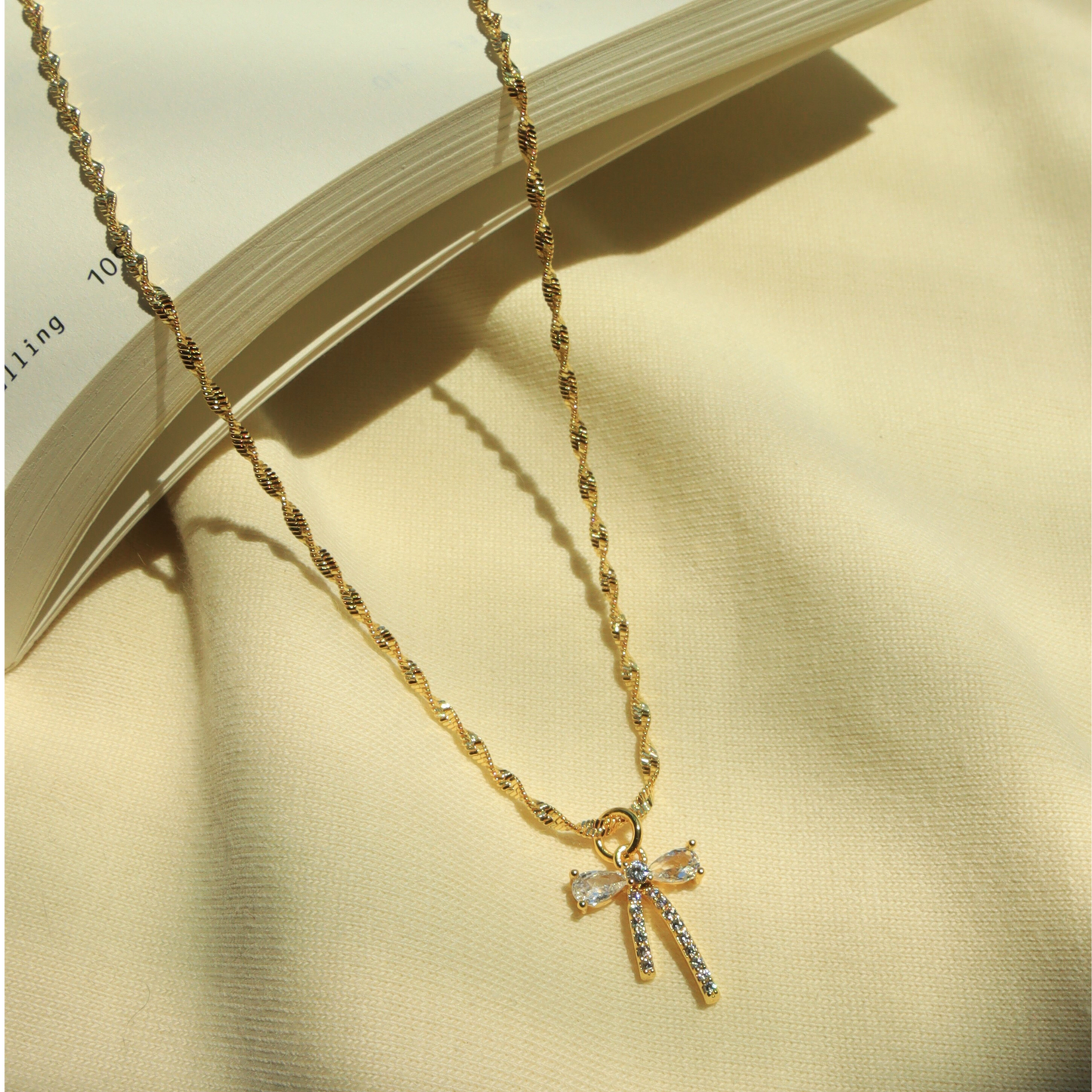 Dainty Bow Pendant Necklace – 18K Gold Plated Stainless Steel | 18” Twist Chain
